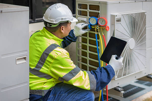 Professional Hvac technician working in White Hall, MD